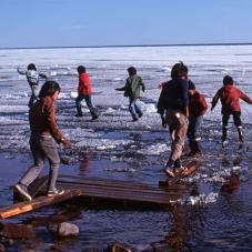 Instead of playing on the mainland, we play on the ice! Délı̨ne, June 1979.