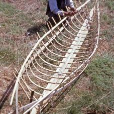 Near Behchokǫ in June 1975, Jean Tinqui built his canoe without a plane or tape measure.