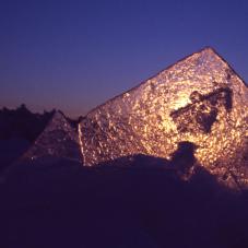 A layer of broken ice rising under the force of the wind and currents.