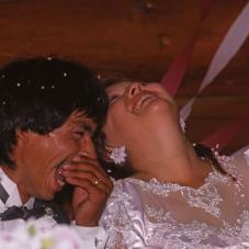 Art Sanderson and Marilyn Miersch in Fort Resolution (Denı́nu Kų́ę́) at their wedding reception, August 1990.