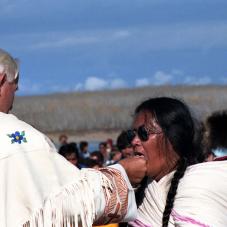Pope John Paul II gives communion to Lucy Jackson in Fort Simpson (Liidli Kue), September 1987.