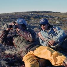 Near Artillery Lake in the fall of 1995. Pete Enzoe and Michael Sanderson looking for caribou.