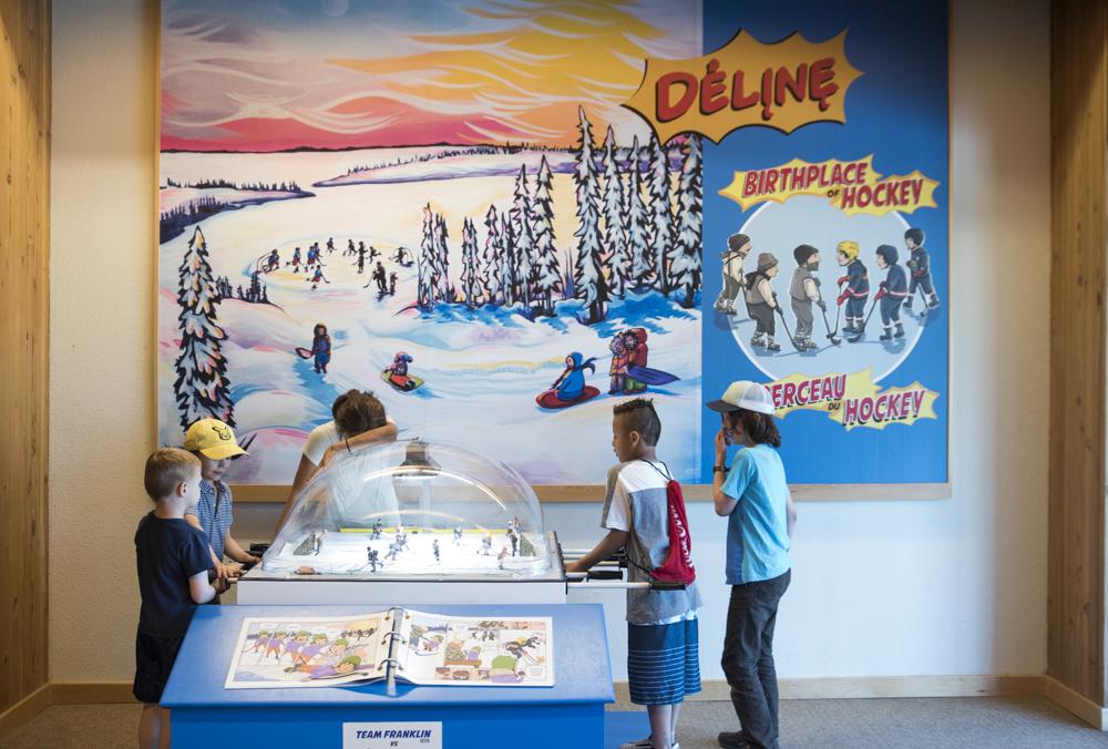 Image of young boy playing table hockey