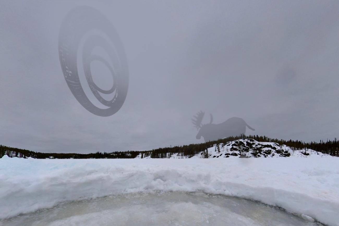 Image of an ice rink on snowy lake.